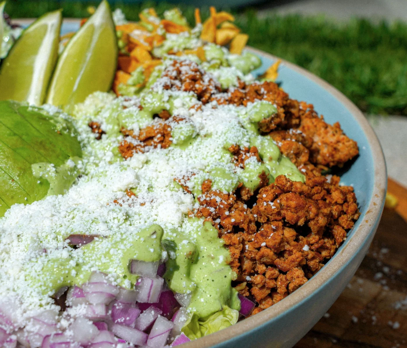 Ground turkey taco salad with creamy cilantro dressing.