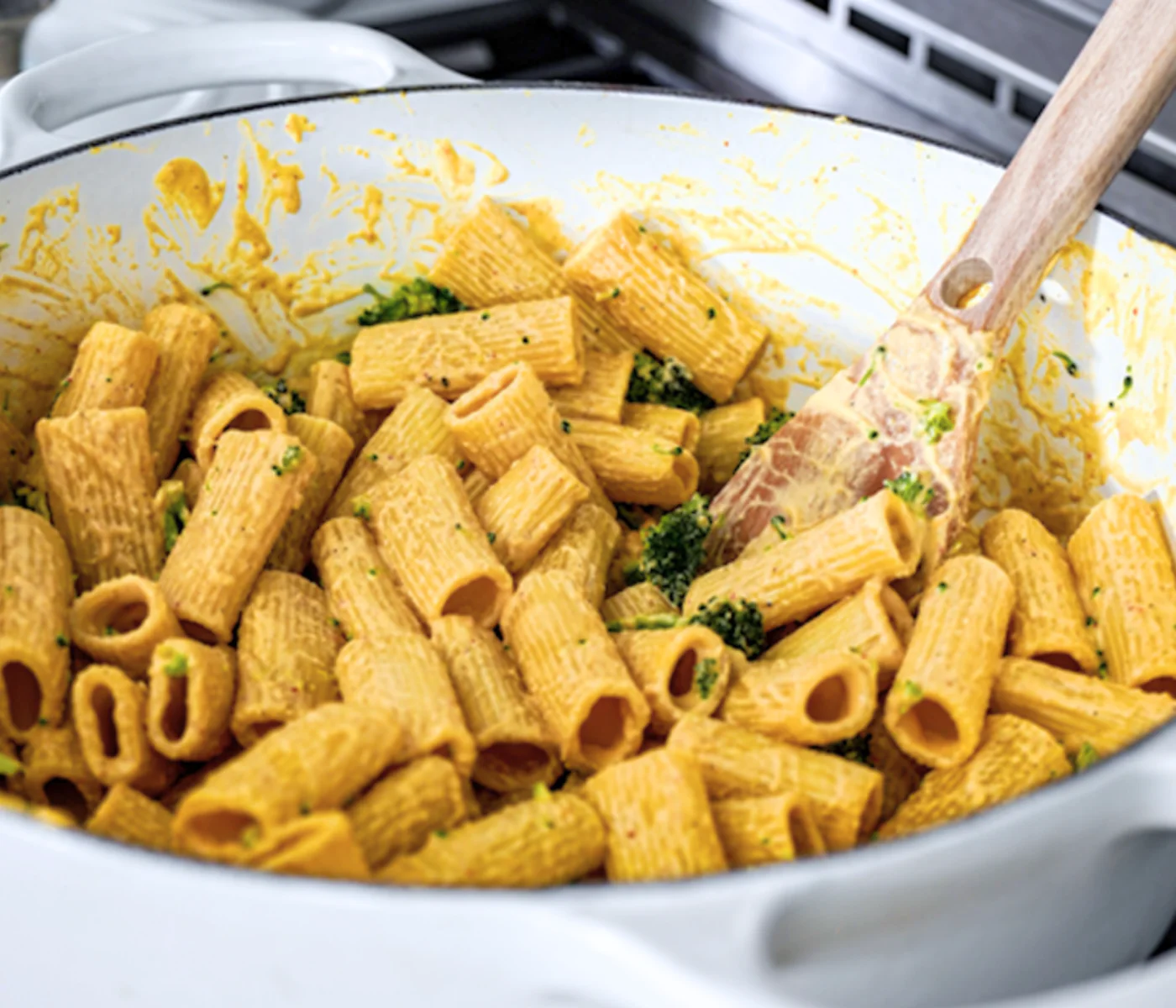 Vegan broccoli and cheese pasta in a pan.